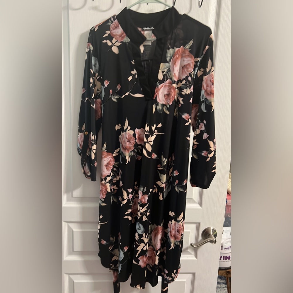 Heimish 3/4 sleeve floral dress.  Tie strap at waist.  Sizes 2X and 3X